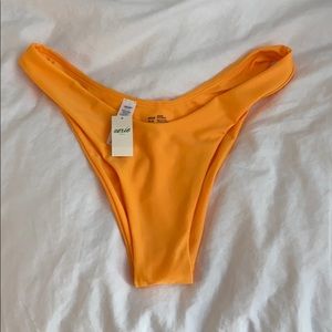 bright yellow high leg bikini bottoms